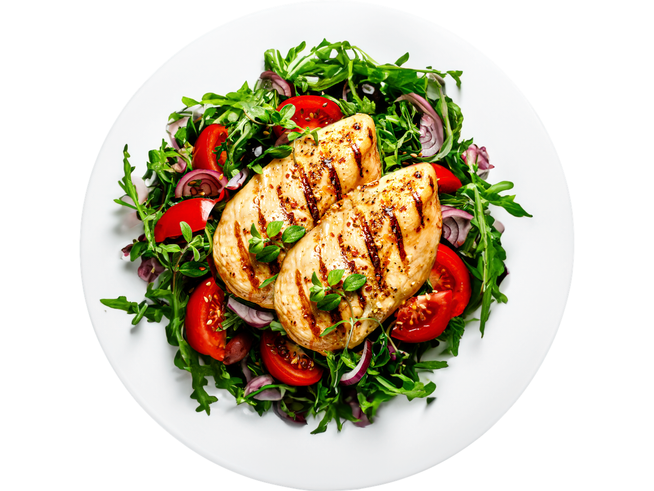 Grilled chicken breast fillets with a fresh salad of arugula, tomatoes, and red onion.