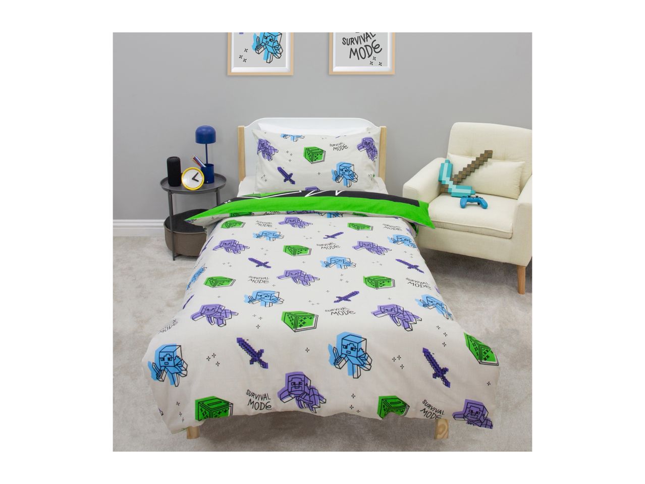Minecraft-themed duvet cover set with characters, swords, and 'SURVIVAL MODE' text in a child's room.