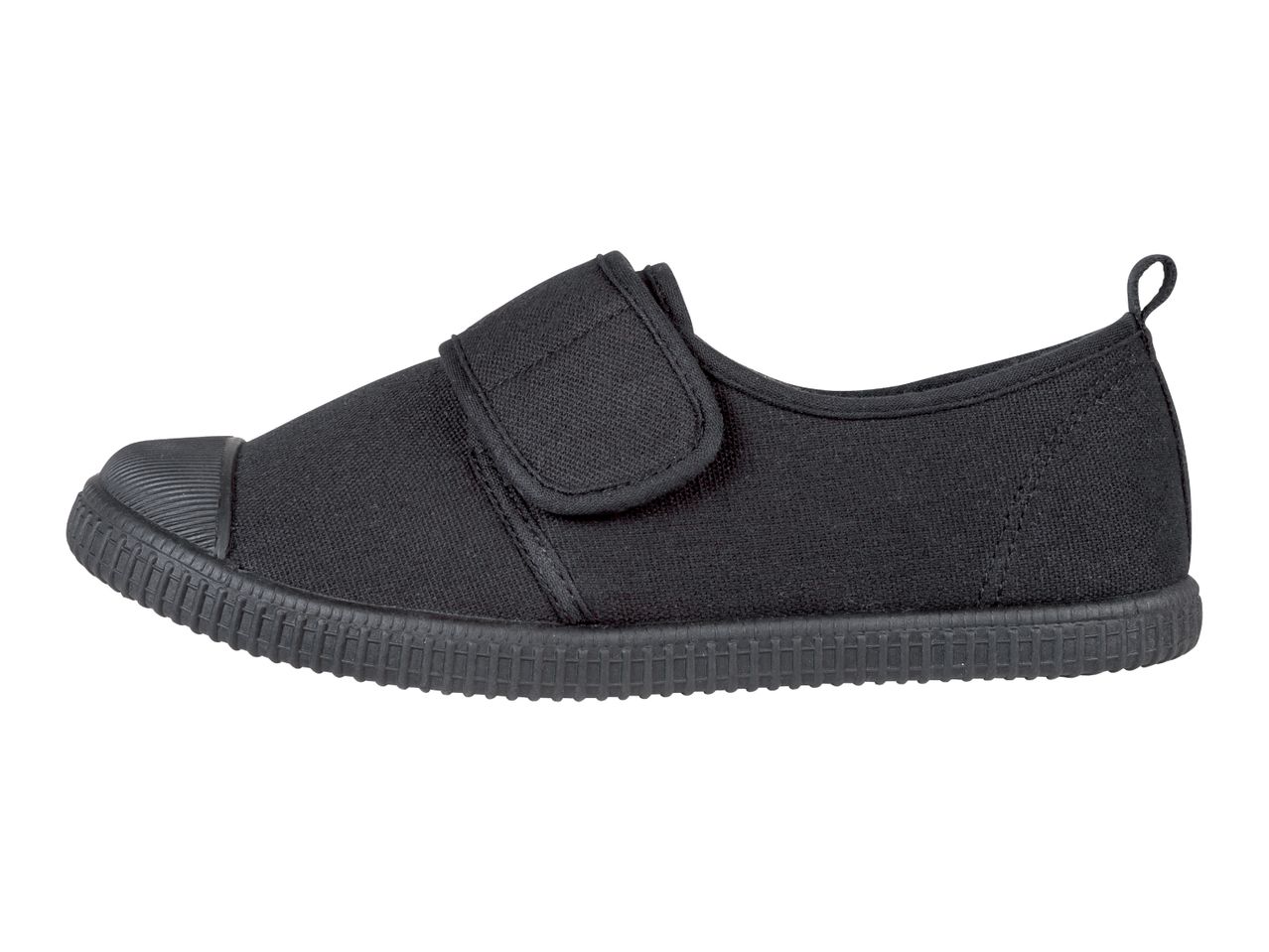A single black canvas slip-on shoe with a velcro strap.
