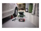 Car maintenance tools, including a jack, torque wrench, battery charger and creeper seat.