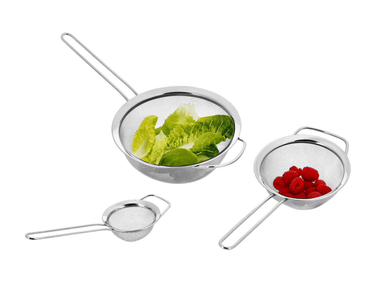 Trois passoires en acier inoxydable de différentes tailles, dont deux contiennent de la laitue et des framboises.