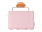 Pink toaster with a bread roll on top, isolated on a white background.