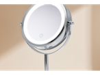 Oglindă de toaletă cu iluminare LED integrată, design modern.