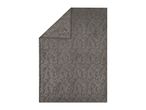 Grey patterned blanket with a folded corner