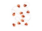 Acorn-shaped string lights with warm glow on a white background.