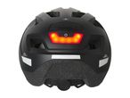 Black bicycle helmet with a red LED rear light and reflective strips