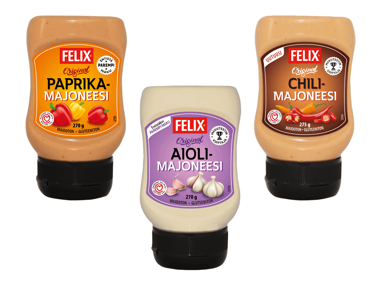 Kolme majoneesipulloa: paprika-, aioli- ja chilimajoneesi.
