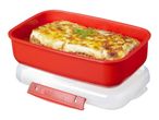 Red rectangular microwave container with baked lasagna, on a clear base with a red clip.