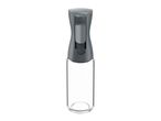 A clear glass spray bottle with a gray top and handle.