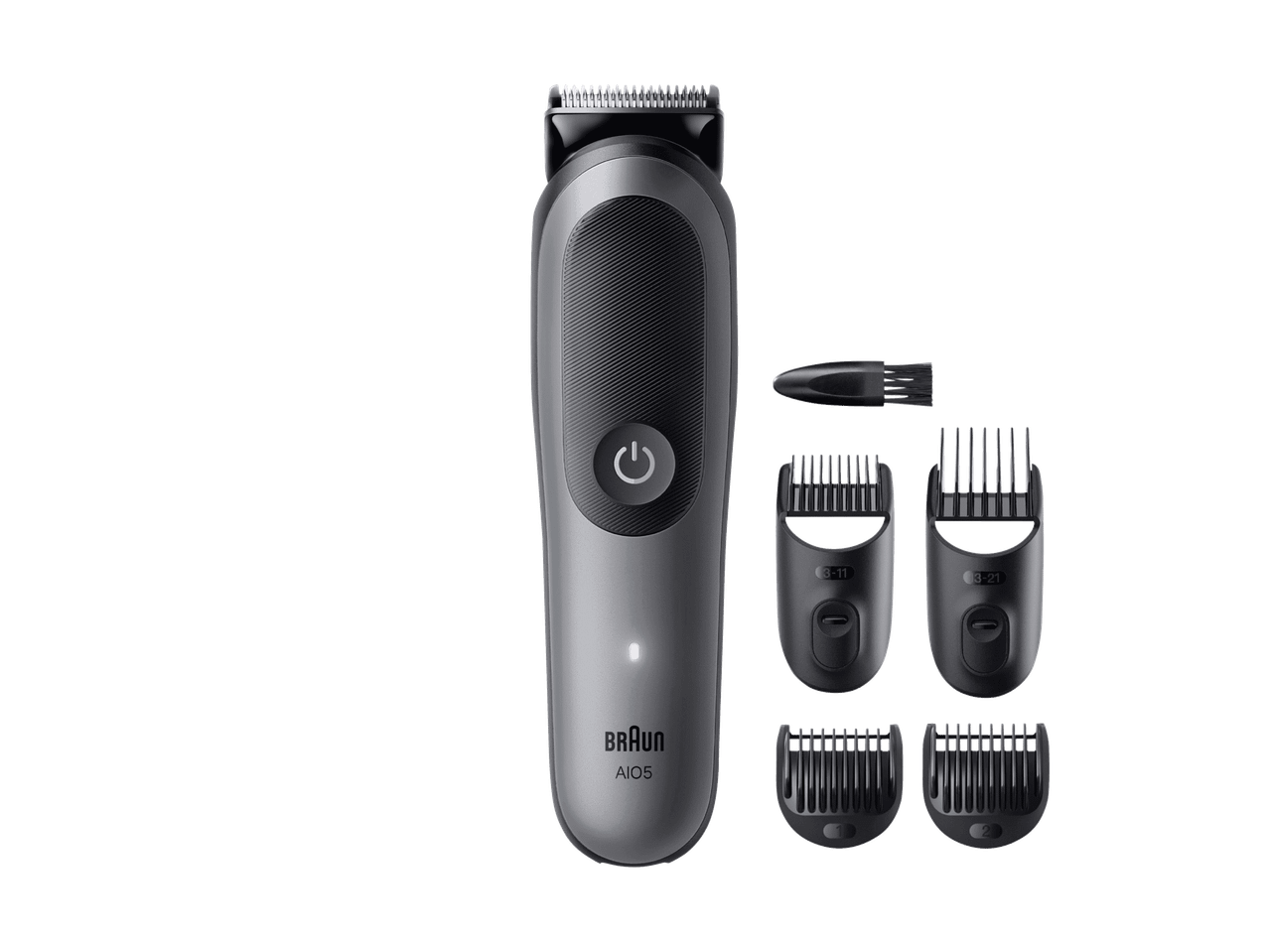Tondeuse à barbe et à cheveux grise avec plusieurs sabots et une brosse de nettoyage.