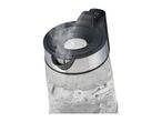Glass kettle with boiling water and steam, showing control buttons on the handle.