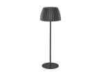 Sort gulvlampe med plisseret skærm og rund fod.