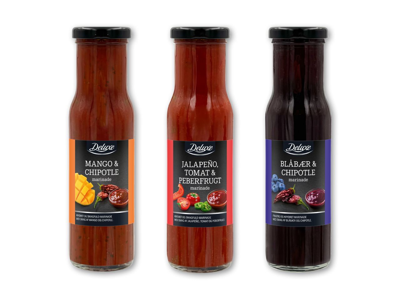 Tre flasker Doe's sauce: mango, tomat og kirsebær.