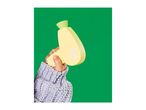 Child's hand in a knitted sleeve holding a yellow toy hairdryer with a green nozzle.