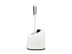 A white toilet brush with a black handle sits in a matching holder.