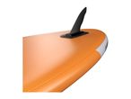Close-up of an orange inflatable stand-up paddleboard with a black fin.