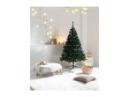 Unadorned Christmas tree in a minimalist room with festive decorations.