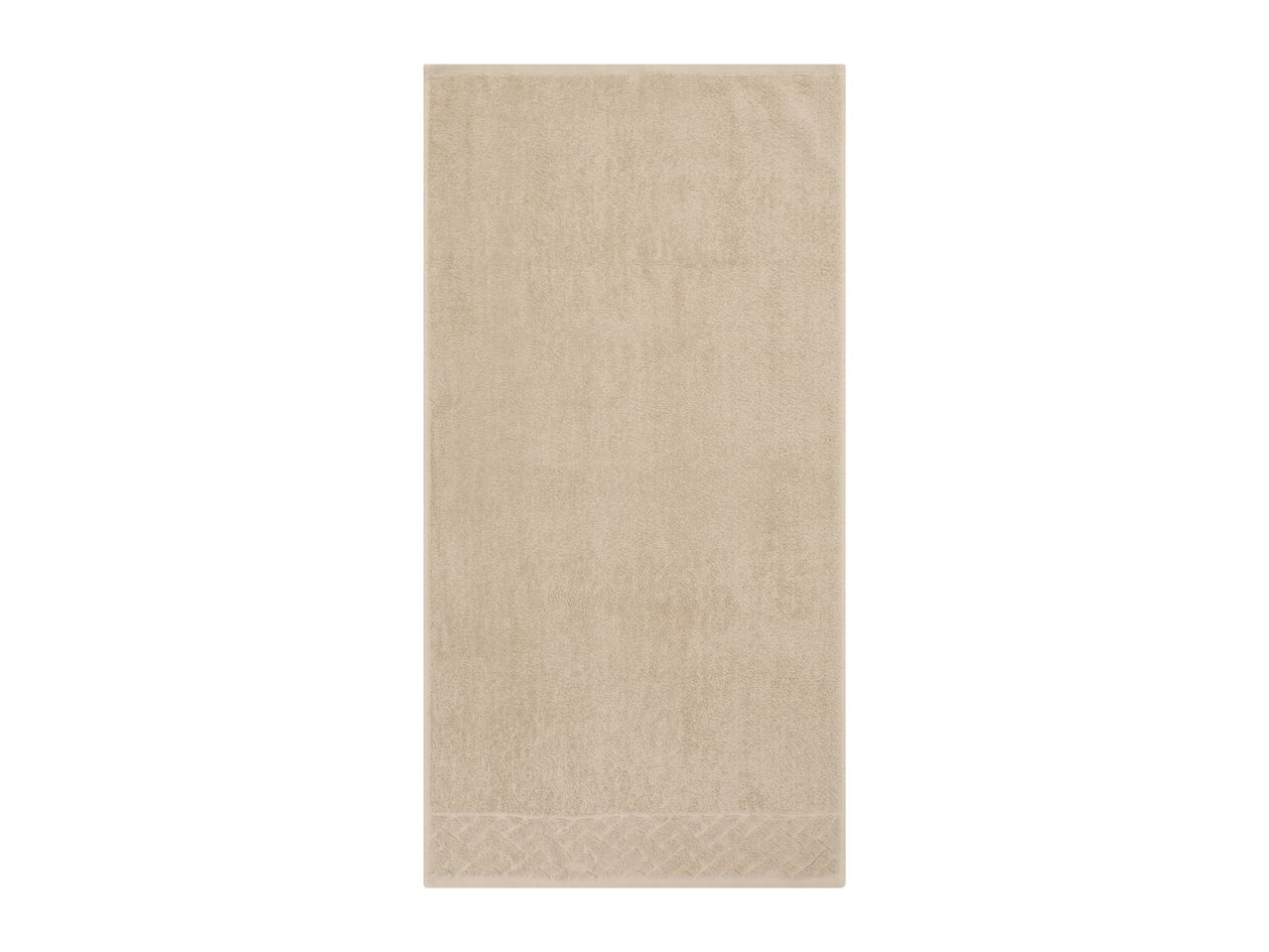 Beige textured rectangular rug.