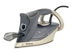 Dark grey and gold steam iron with a transparent water tank and black power cord.