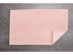 LIVARNO home pink bath mat on a gray tiled floor