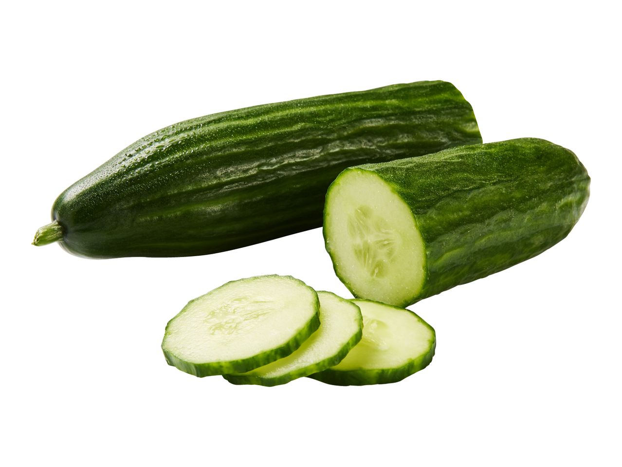 One whole cucumber, one half cucumber, and three fresh cucumber slices on a white background.