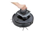 Hand removing the water tank from a robotic vacuum cleaner