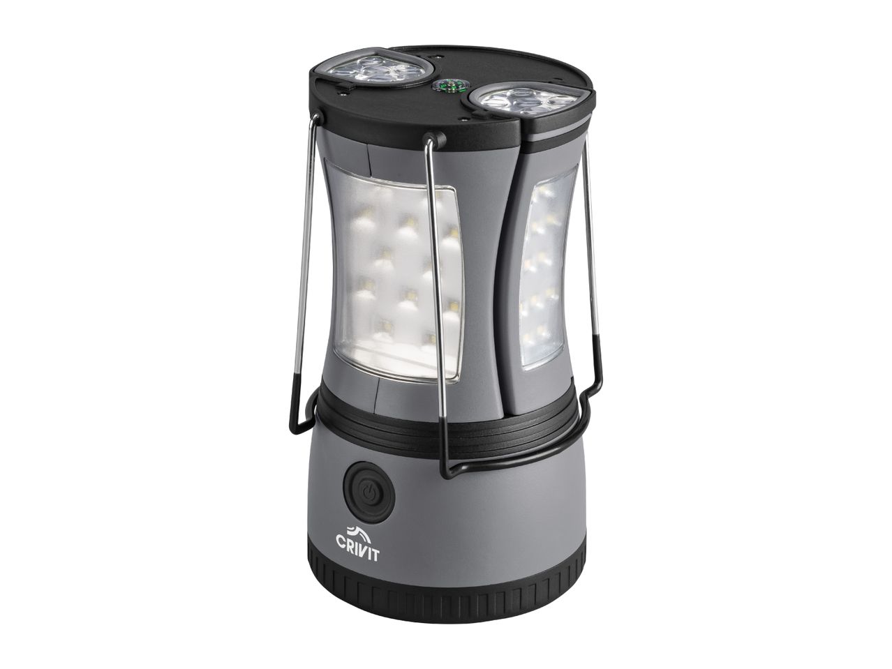 A grey camping lantern with LED lights, a compass on top, and a power button on the side.