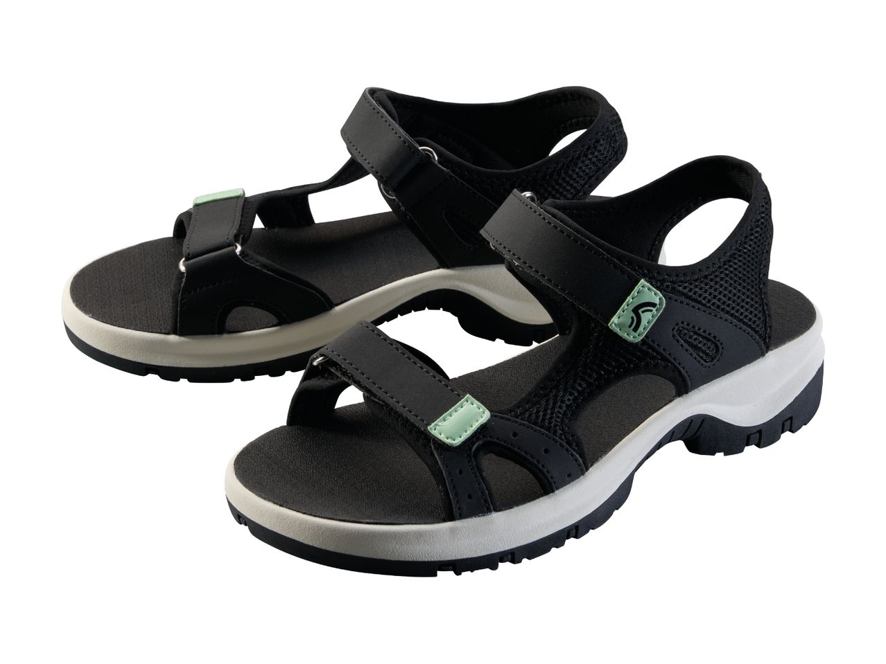 Pair of black and white sports sandals with light green accents.