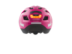 Roze CRIVIT kinderfietshelm met geïntegreerd LED-achterlicht.