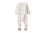 Back view of a white baby romper with a brown acorn pattern.