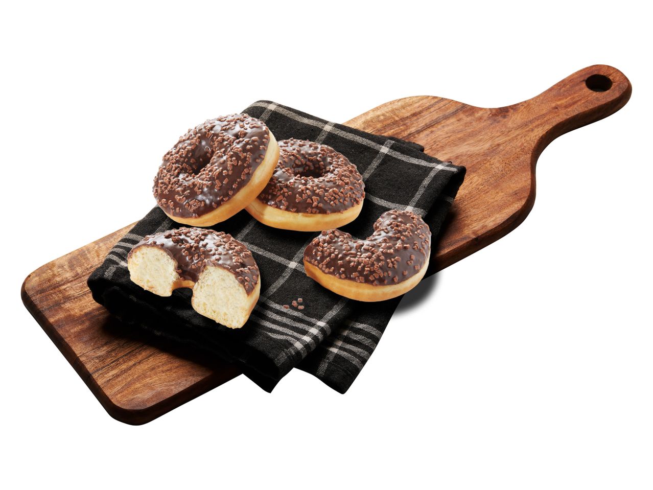 Chokladmunkar med strössel på en träbräda.