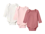 Tre langærmede babybodystockings i hvid, lyserød og mørk rosa.