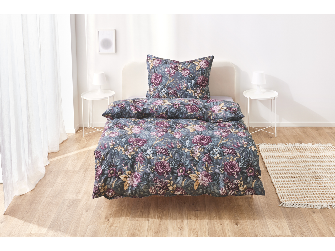 Floral bedding set, mostly roses.