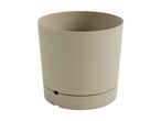 A beige plastic planter with a drainage hole.