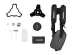 Various accessories for a brush cutter, including a harness, blades, and tools.