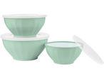 Set of three light green mixing bowls with white lids, one bowl open with lid askew.