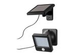 Black solar panel and LED motion sensor light with connecting cable