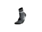 A single grey and black athletic sock with white accents and a logo.