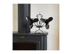 VonHaus heat-powered stove fan on a black wood-burning stove.
