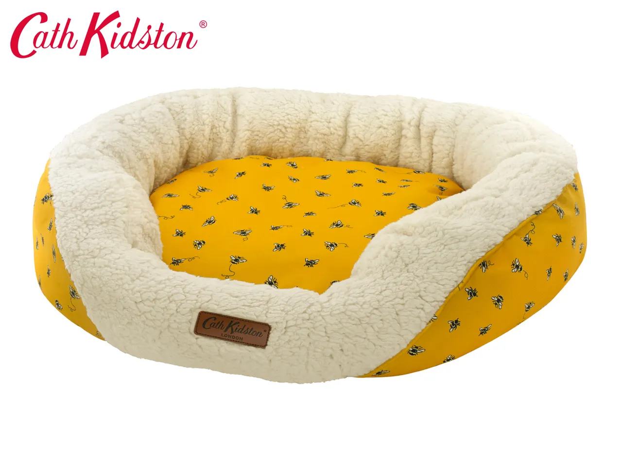 Cath Kidston yellow pet bed with a bee pattern and a cream fleece lining.