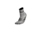A single grey and black athletic sock with a mountain logo.