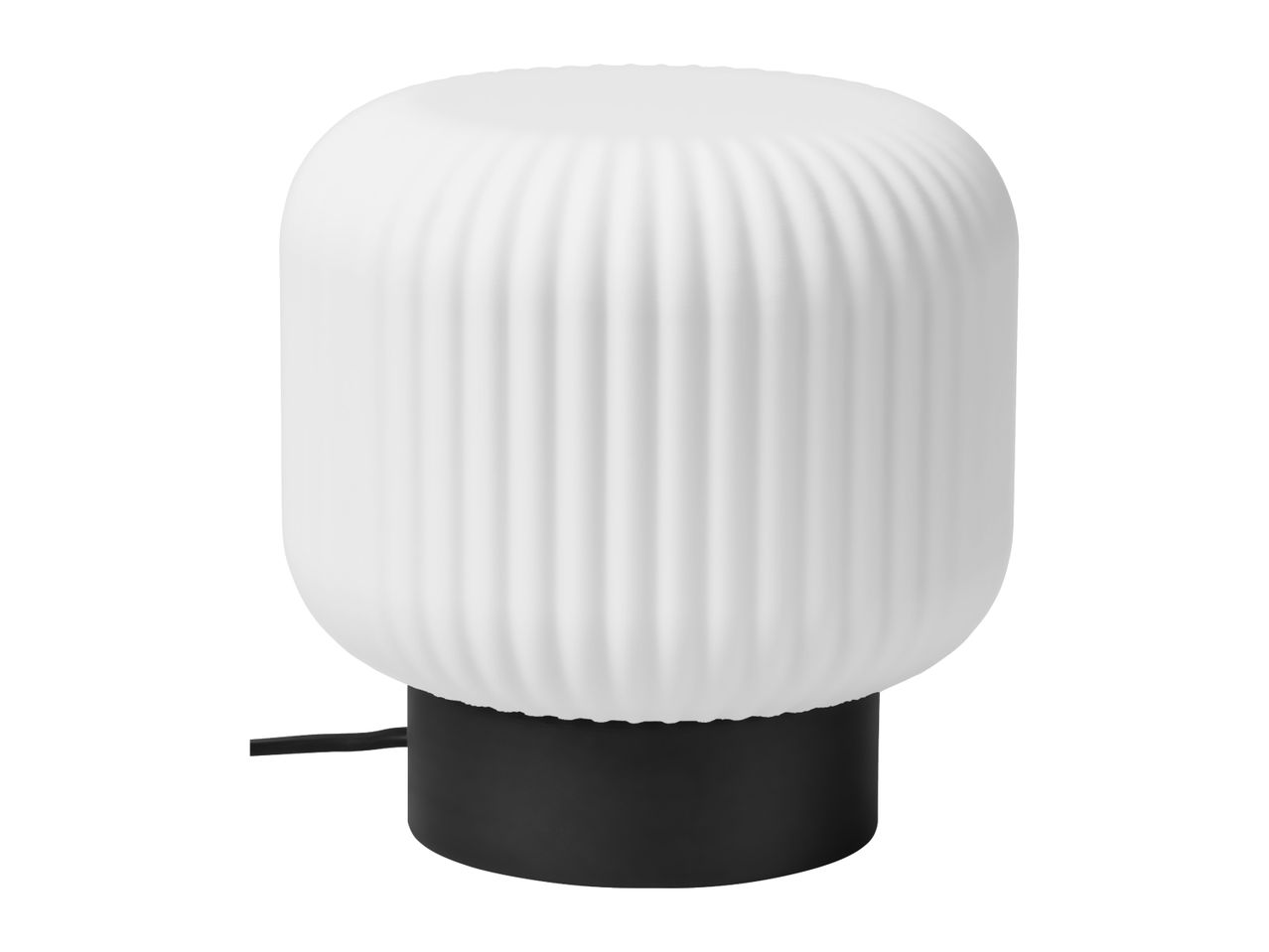 Modern table lamp with a ribbed white glass shade and a black base