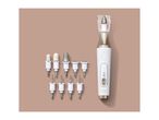 Electric nail file with various attachments for manicure and pedicure.