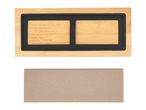 Bamboo sharpening stone holder with a sharpening stone, showing company details.