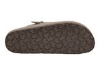 Brown sandal with a patterned sole, viewed from the bottom.