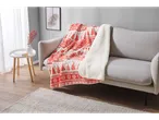 LIVARNO home Christmas blanket with red and white tree and snowflake pattern on a sofa