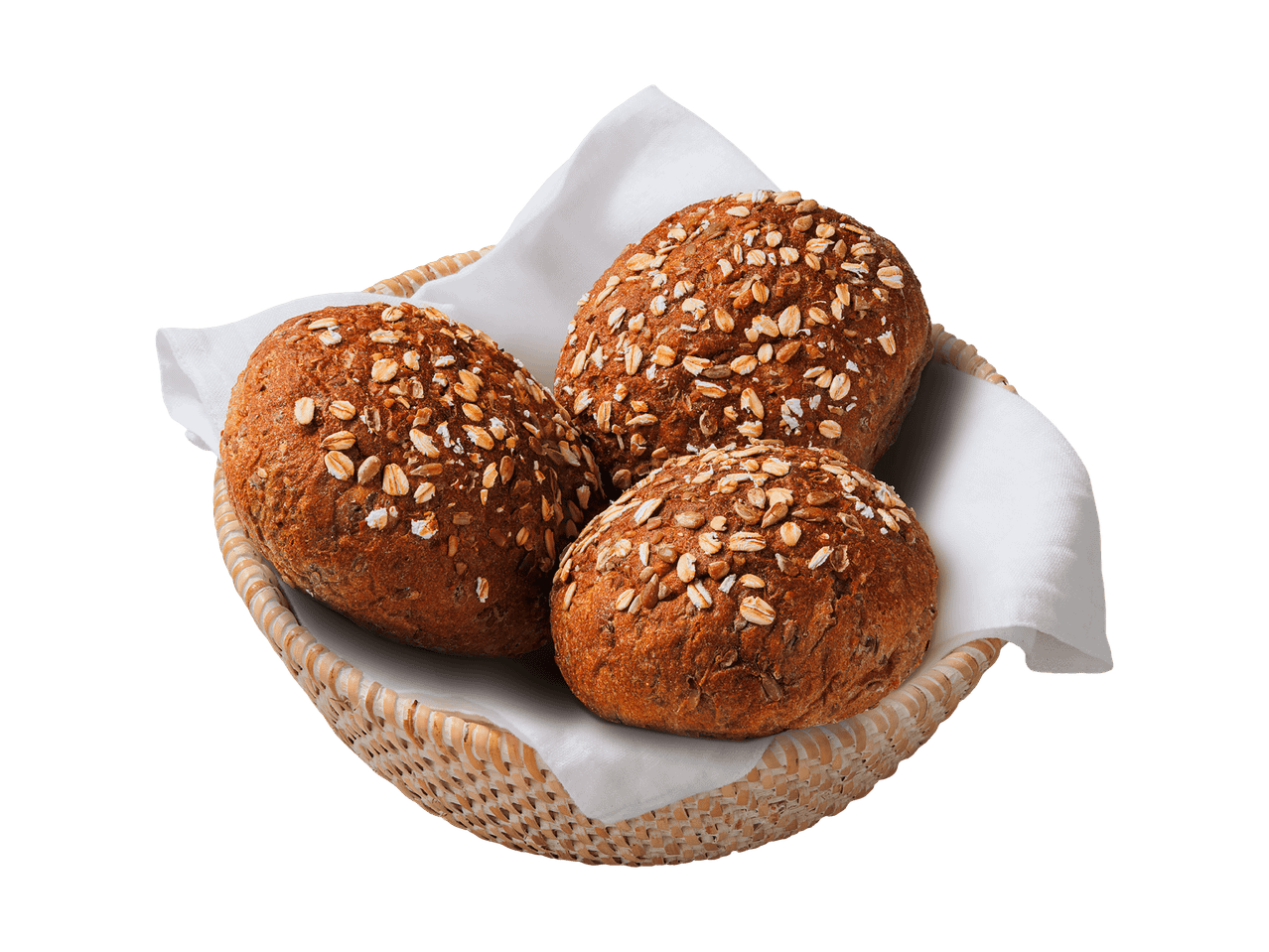 Trois petits pains aux céréales dans un panier en osier avec une serviette blanche.