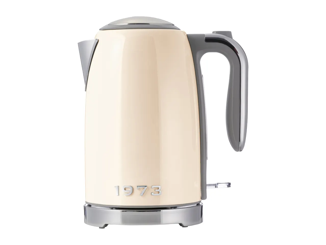 Cream-colored electric kettle with chrome accents and '1973' embossed on the front
