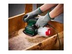Person in gloves sanding a wooden surface with a Parkside orbital sander.