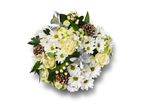 A festive bouquet with white chrysanthemums, roses, pinecones, and silver accents.